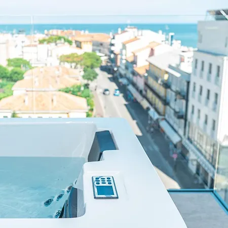 The One Caorle - Hotel & Apartments Exterior foto A remote control for a window air conditioner