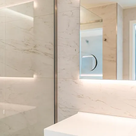 The One Caorle - Hotel & Apartments Exterior foto Bathroom with backlit mirror