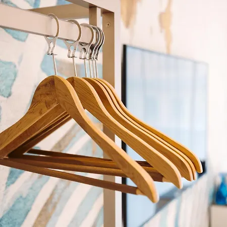 The One Caorle - Hotel & Apartments Exterior foto Wooden clothes hangers